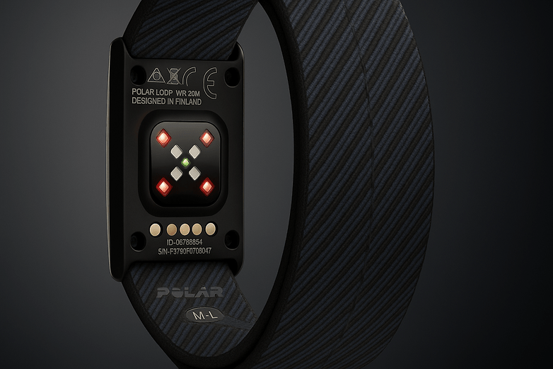 Close-up of a Polar Loop fitness tracker with a black strap and sensor interface. Close-up of a Polar Loop fitness tracker with a black strap and sensor interface.