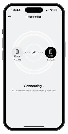 Écran de transfert de fichiers montrant la connexion à OnePlus 12 et iPhone.