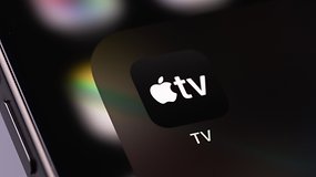 Close-up of the Apple TV+ app icon on a dark background.