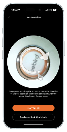 Lens correction interface showing instructions for aligning an ear spoon.