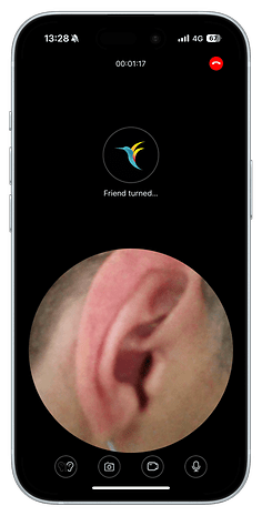 A phone screen displaying a video call with an image of an ear and a 'Friend turned...' message.