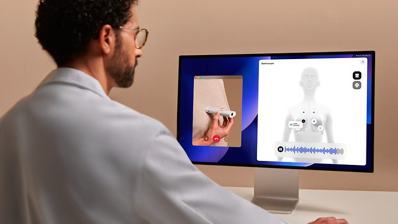 A doctor looking at a patient's health data on a desktop display
