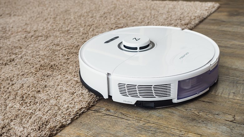 Roborock S8 lifting up to clean a carpet