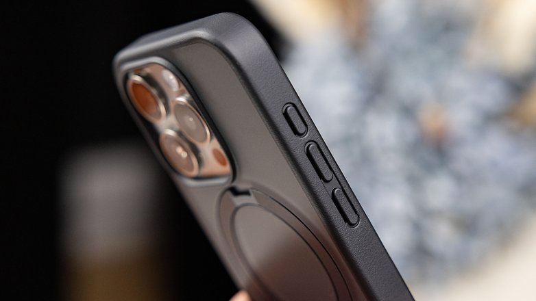 Close-up of the Torras Ostand case on an iPhone 15 Pro, focusing on the volume buttons and side view.