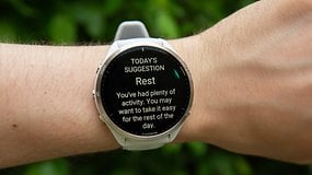 A Garmin Forerunner 965 watch displaying a suggestion to rest after a day of activity.