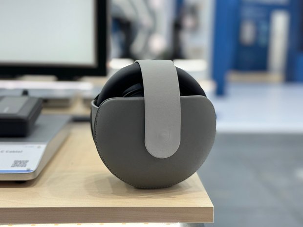 The Soundcore Space One Pro Bluetooth headphones seen from the front and folded within its storage.