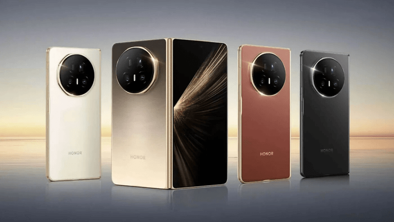 Quatre smartphones Honor Magic V5 de différentes couleurs sur un fond dégradé. Quatre smartphones Honor Magic V5 de différentes couleurs sur un fond dégradé.