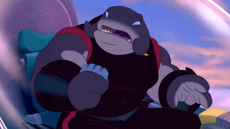 A large, muscular alien with gray skin and a fierce expression, wearing a black outfit, in a spaceship. A large, muscular alien with gray skin and a fierce expression, wearing a black outfit, in a spaceship.