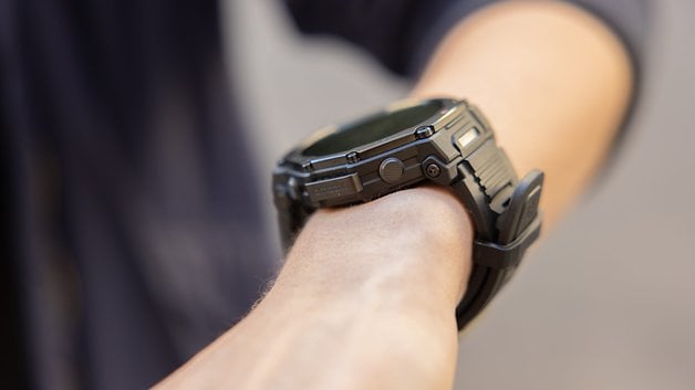 A close-up of an Amazfit T-Rex Pro 3 smartwatch on a person's wrist.