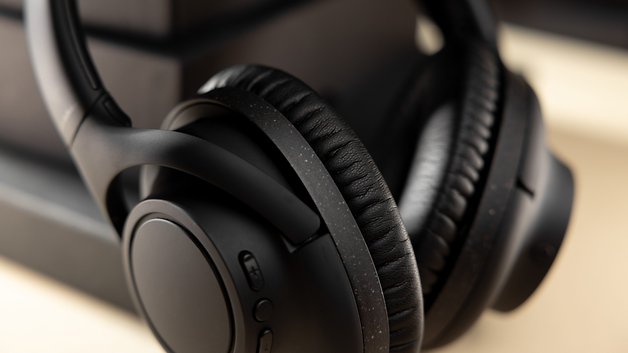 The Audio-Technica ATH-S300BT headphones as seen from the front with a close-up of its headband.