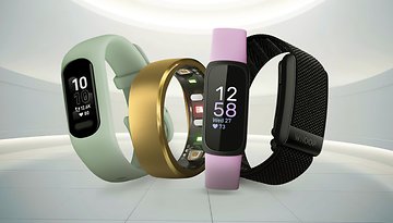 Three fitness trackers in various colors displaying heart rates and steps.