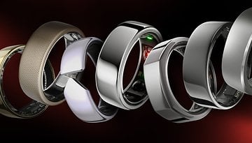 Seven diverse smart rings displayed in a row, aligned side by side.