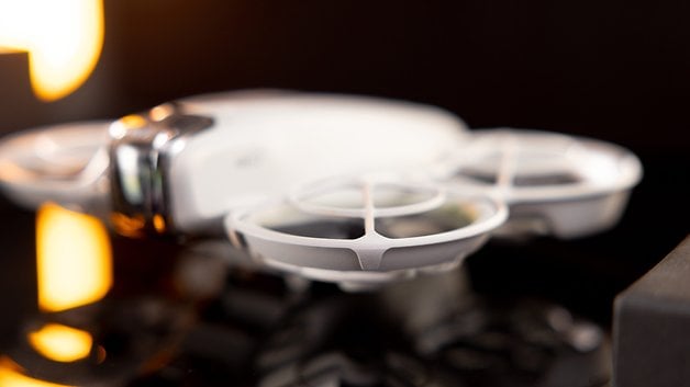 Close-up of a DJI Neo drone showing its sleek design and propeller guards.