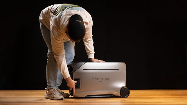 Person adjusting the EcoFlow Delta Pro 3 portable power station.