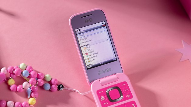 A pink flip phone with a screen displaying bookmarks on a pink background.