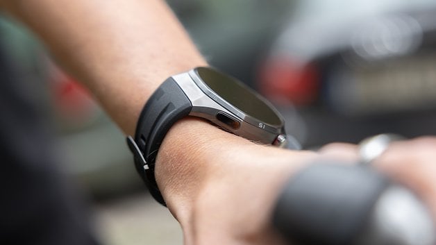 A close-up of a Huawei Watch GT 6 Pro on a person's wrist.