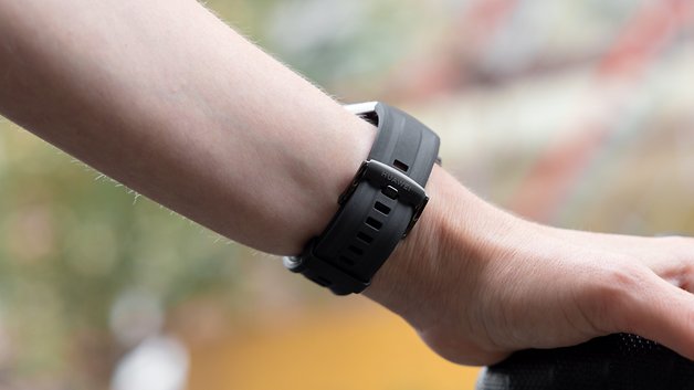 A close-up of a Huawei Watch GT 6 Pro on a person's wrist.