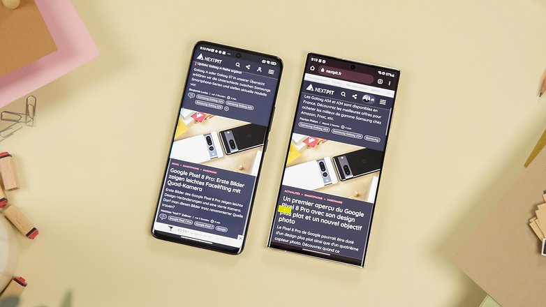 Die Displays der beiden Smartphones direkt nebeneinander auf einem Tisch