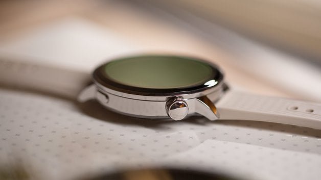 A close-up of the OnePlus Watch 3, showcasing its sleek design and round display.