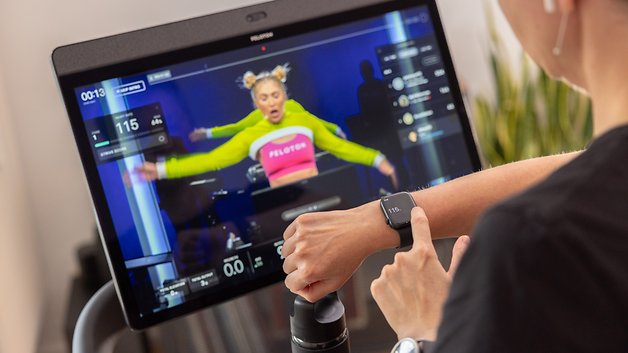 A person connecting the Apple Watch to the Peloton Tread