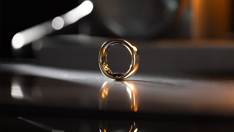 RingConn Smart Ring Gen 2 in gold on the table