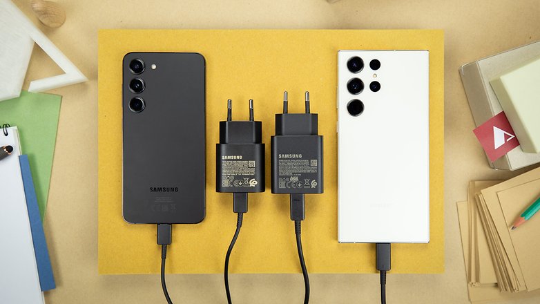 Samsung Galaxy S23 and S23 Ultra with their respective power adapters.