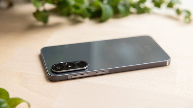 The Samsung Galaxy A56's back, placed faced down on a table.