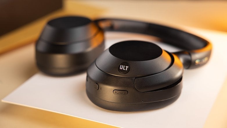 Close-up of black Sony headphones featuring 'ULT' branding on the earcup. Close-up of black Sony headphones featuring 'ULT' branding on the earcup.