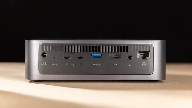 A Ugreen Nasync DXP480T Plus device showing various ports including USB, HDMI, and Ethernet.