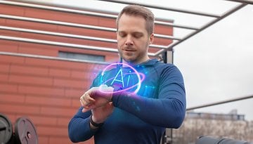 A man using a smartwatch with a glowing 'AI' symbol, suggesting an AI coaching feature.