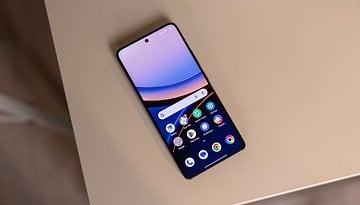 A Poco F7 Ultra smartphone displaying a colorful home screen on a beige surface.