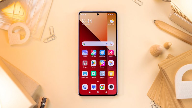 Redmi Note 13 Pro 4G viewed from the front, showing the default home screen