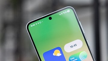 Top portion of a Samsung Galaxy A-series smartphone displaying a green screen with app icons and the time 15:45.