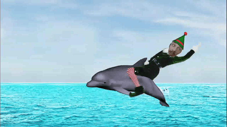 Screenshots from the ElfYourself app featuring an elf-like character riding a dolphin.