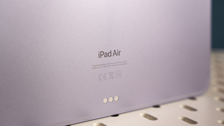 Apple iPad Air 2024 back side showing the pogo pin contacts for the optional keyboard