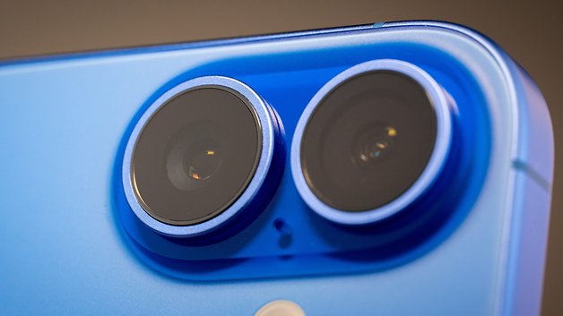 Close-up of the dual camera lenses of an Ultramarine Apple iPhone 16.