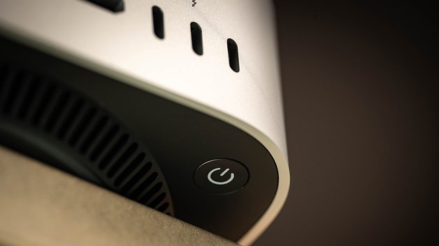 Close-up of the power button and ventilation of an Apple Mac Mini M4 2024.