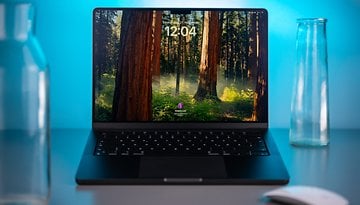 Apple MacBook Pro M4 mit einem Wald-Hintergrund, der die Uhrzeit 12:04 zeigt.