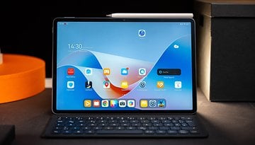 Huawei MatePad Air mit Tastatur, zeigt verschiedene App-Symbole auf dem Bildschirm.