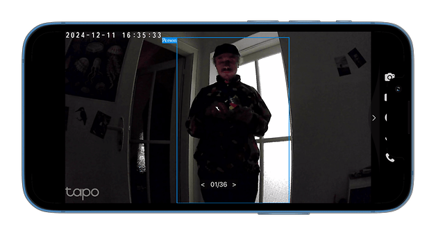 Security camera images showing a person standing in a doorway, with timestamp and app interface.