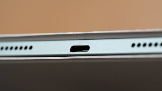 Close-up of the Xiaomi Pad 7 with a USB-C port and speaker holes.