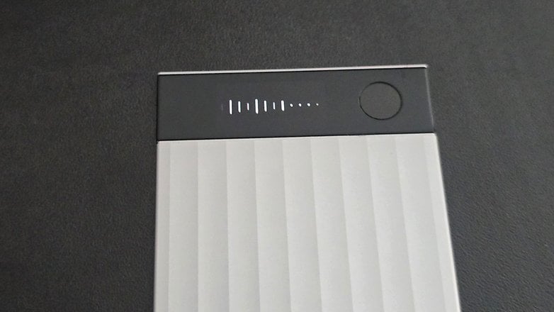 Top view of a Plaud Note Pro device displaying battery indicators and a power button.