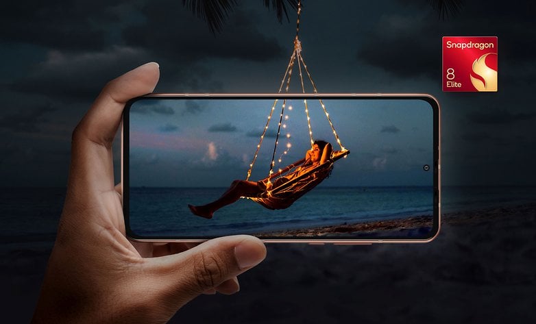 A hand holding a smartphone displaying a person swinging with lights on a beach at night, tagged 'Snapdragon 8 Elite'.