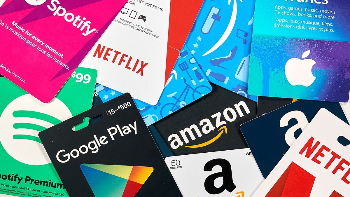 A collection of various gift cards including Amazon, Apple, Spotify, Netflix, and Google Play.