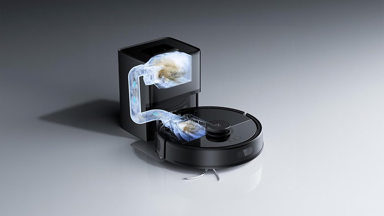 Ein Roborock Q7 L5 Plus Saugroboter mit einer Reinigungsstation und transparenten Rohren, die die Schmutzsammlung zeigen. Ein Roborock Q7 L5 Plus Saugroboter mit einer Reinigungsstation und transparenten Rohren, die die Schmutzsammlung zeigen.