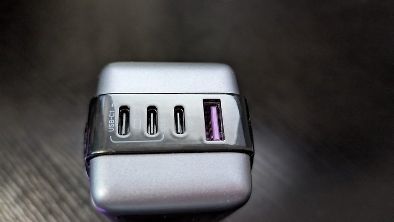 Close-up of a Ugreen Uno 100W charger with four USB ports, including one USB-C.