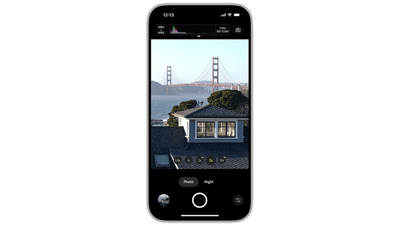 A smartphone displaying a photo of the Golden Gate Bridge over water. A smartphone displaying a photo of the Golden Gate Bridge over water.