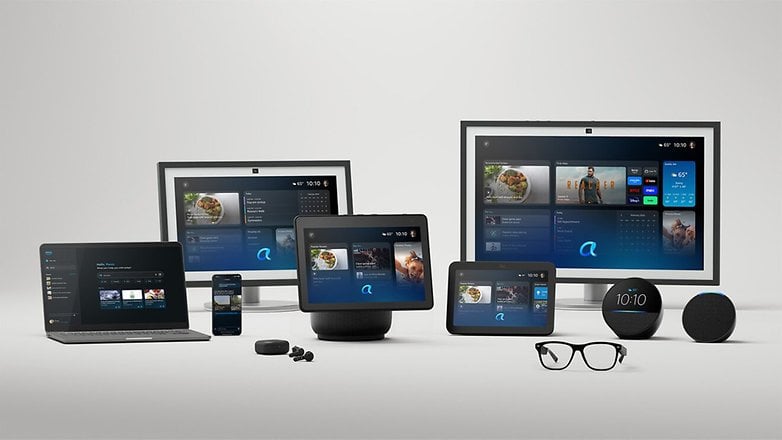 Various Amazon devices including laptops, screens, and smart speakers on a neutral background.