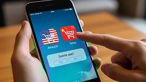 A hand holding an iPhone displaying Amazon and Temu app icons with a delete confirmation message.