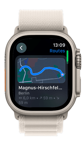 Apple Watch display showing a map route in Berlin with distance and direction.